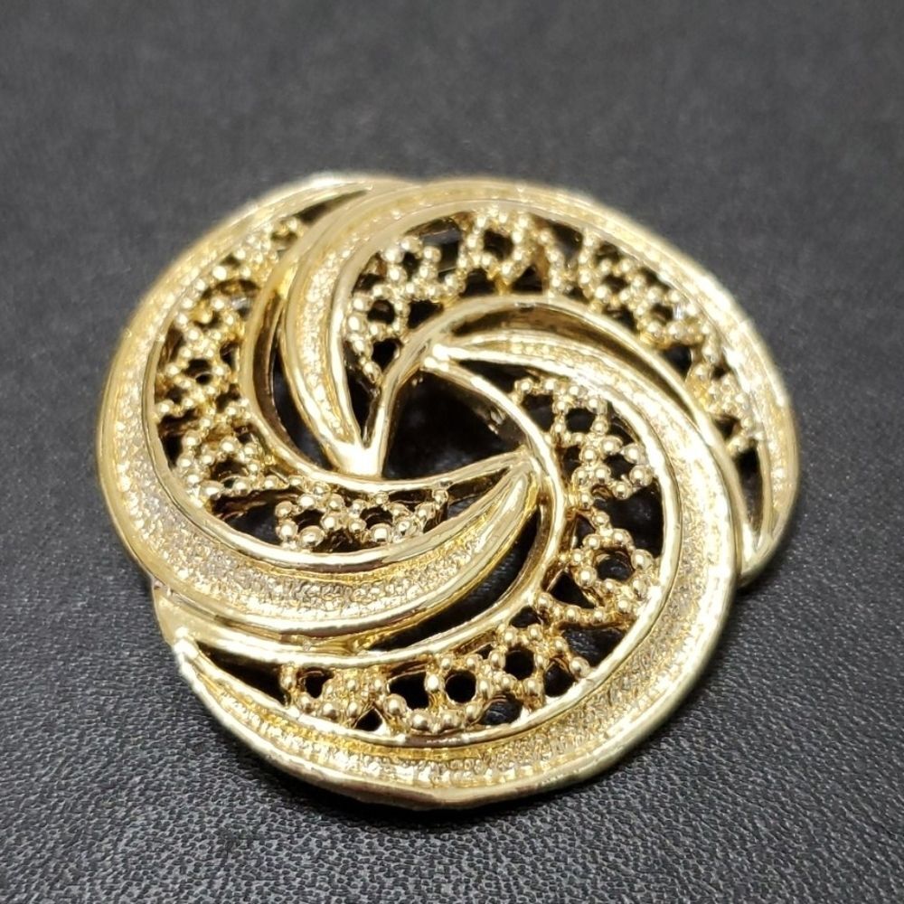 Gerry's gold tone swirl brooch